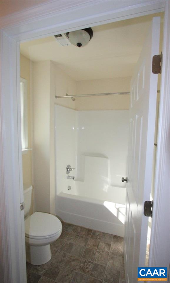 12 Winding Ridge Way Bumpass, VA 23024 - Photo 18 of 18 a bathroom with a toilet and a shower