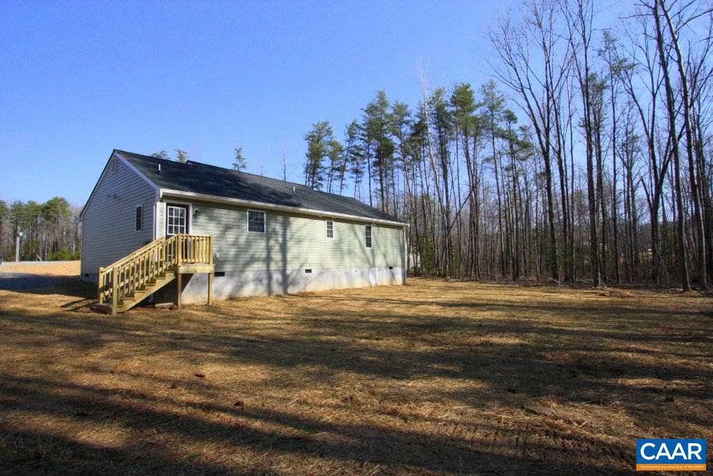 12 Winding Ridge Way Bumpass, VA 23024 - Photo 4 of 18 a view of a house with backyard and trees