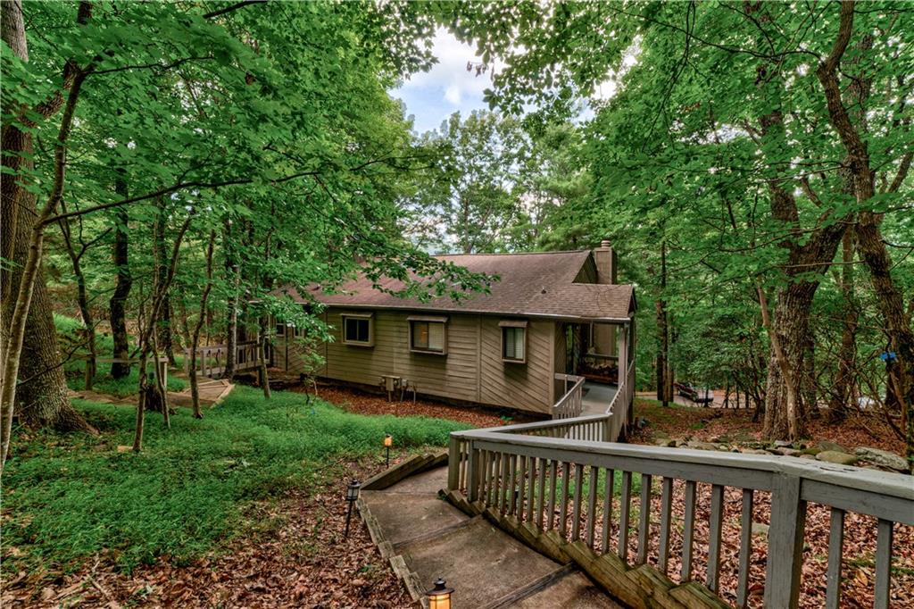 200 Villa Road, Unit 103 Jasper, GA 30143 - Photo 1 of 1 a view of house with roof deck