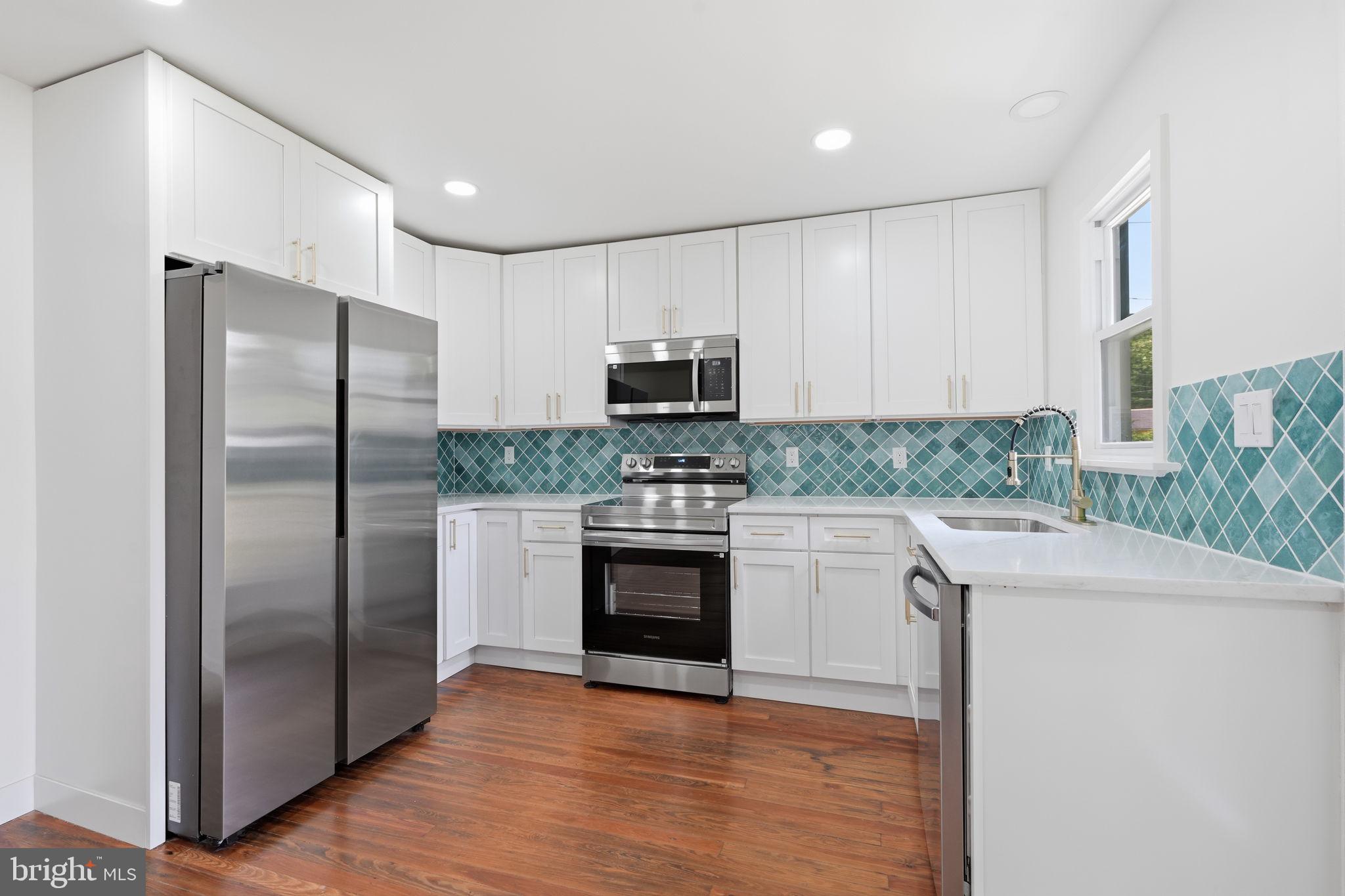 124 Cedar Road Riegelsville, PA 18077 - Photo 11 of 50 Modern kitchen with stylish accents.