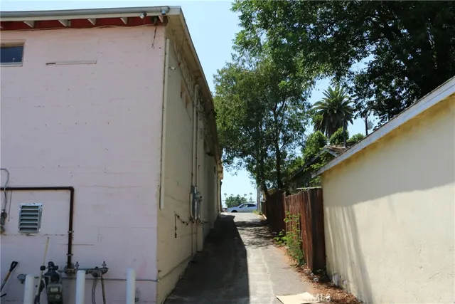 a view of a house with a tree