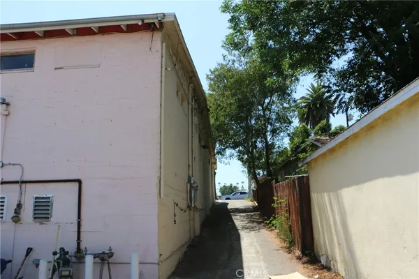 a view of a house with a tree