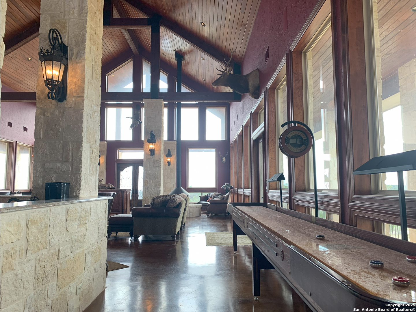 0 Pvt Road Hondo, TX 78861 - Photo 16 of 31 a living room with furniture and floor to ceiling windows