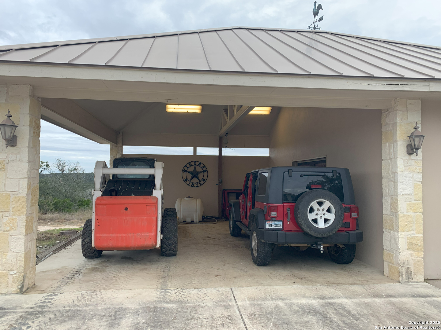 0 Pvt Road Hondo, TX 78861 - Photo 25 of 31 a utility room with stainless steel appliances and cabinets