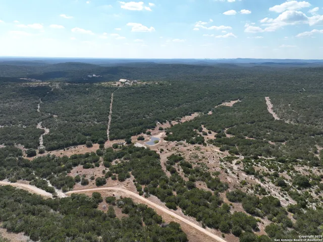 a view of a lake with a city