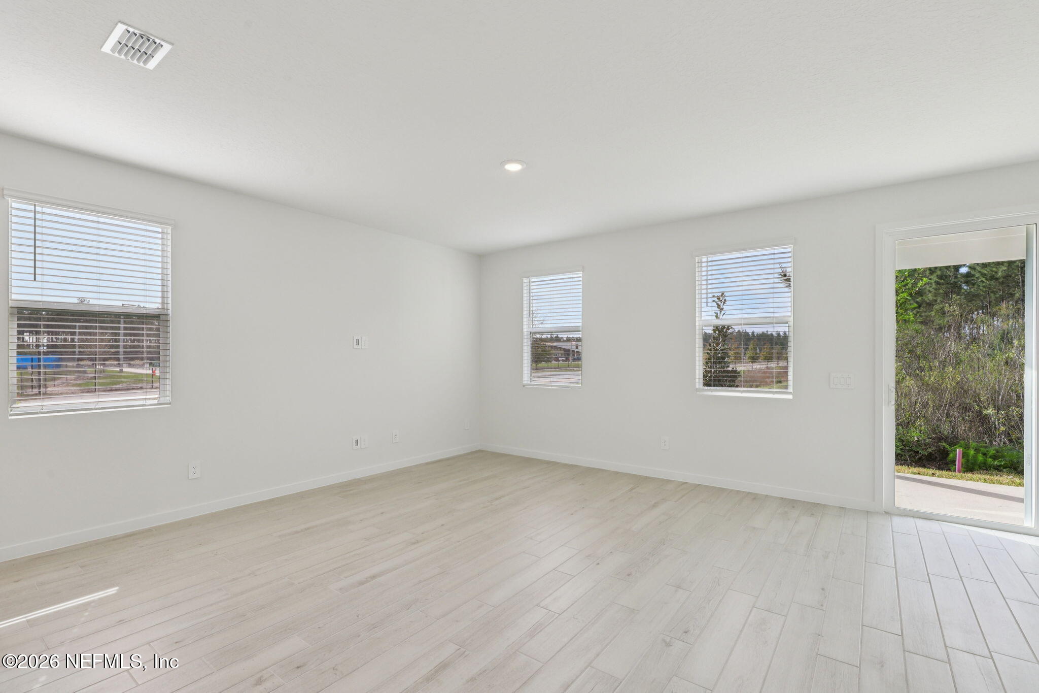 25 Rangeline Drive St. Augustine, FL 32092 - Photo 26 of 43 a view of room with window and hardwood floor
