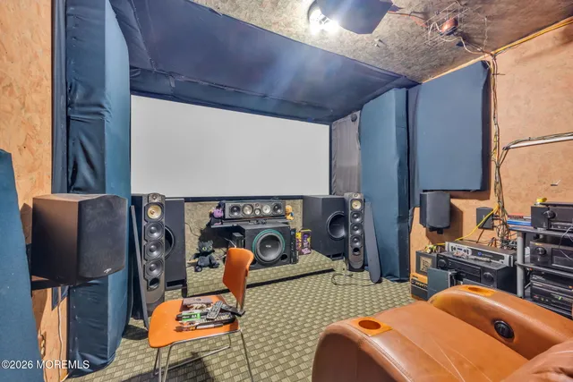 a room with furniture and a flat screen tv