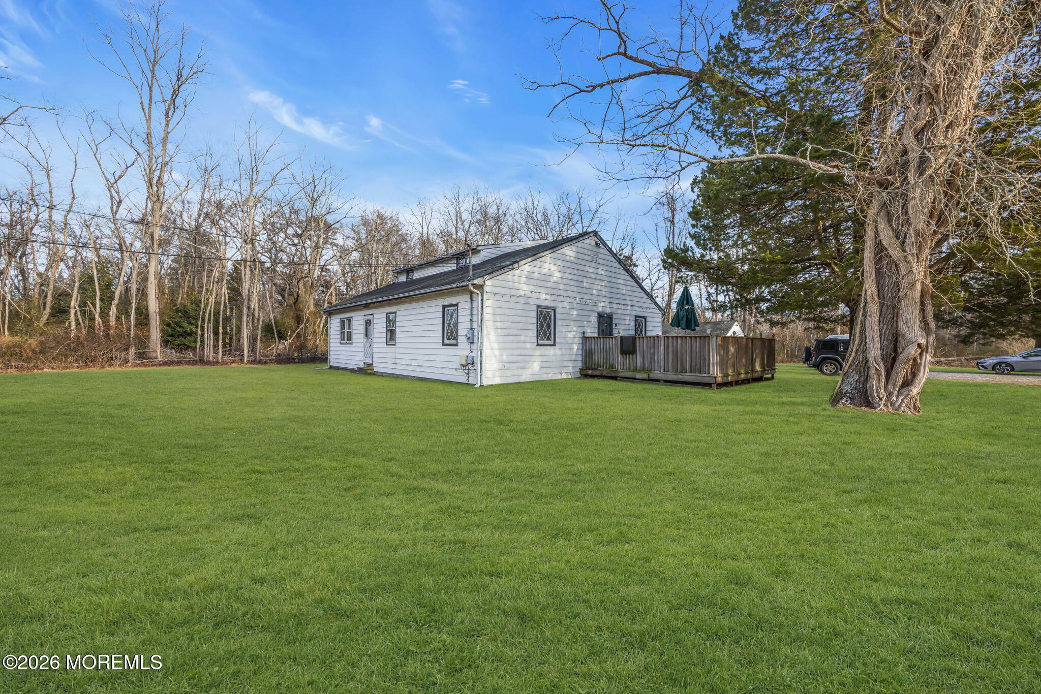 141 Jackson Mills Road Freehold, NJ 07728 - Photo 2 of 39 a view of a house with backyard and garden