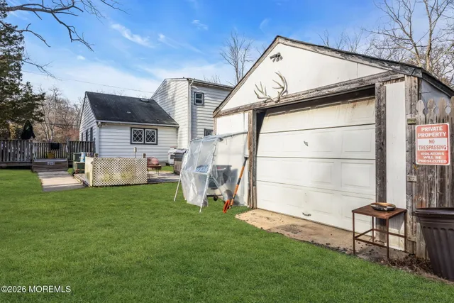 a view of a backyard of the house