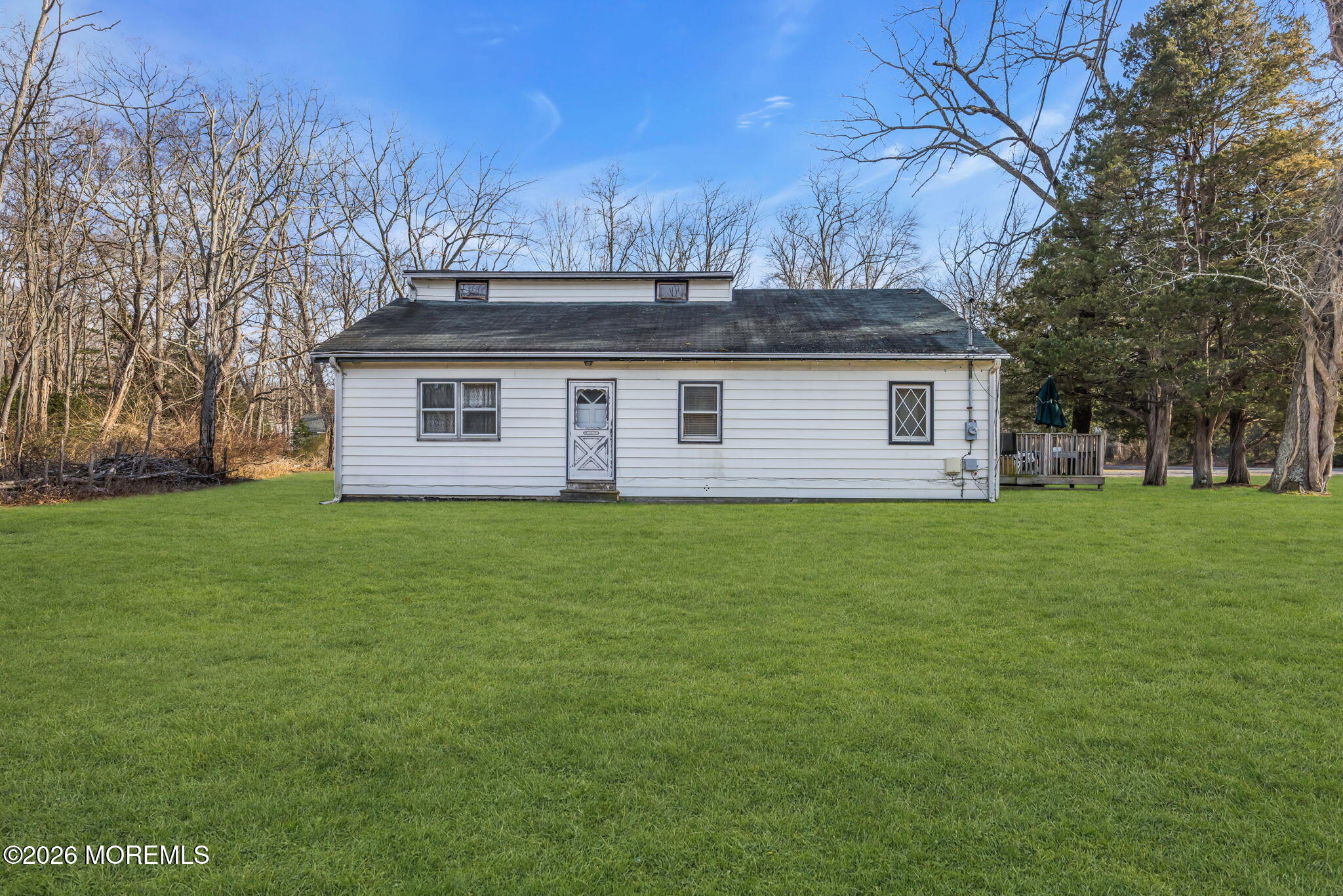 141 Jackson Mills Road Freehold, NJ 07728 - Photo 8 of 39 a view of a house with a yard