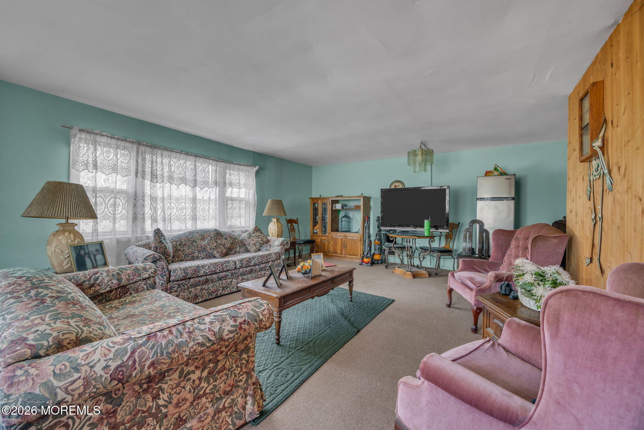 141 Jackson Mills Road Freehold, NJ 07728 - Photo 8 of 39 a living room with furniture and a flat screen tv