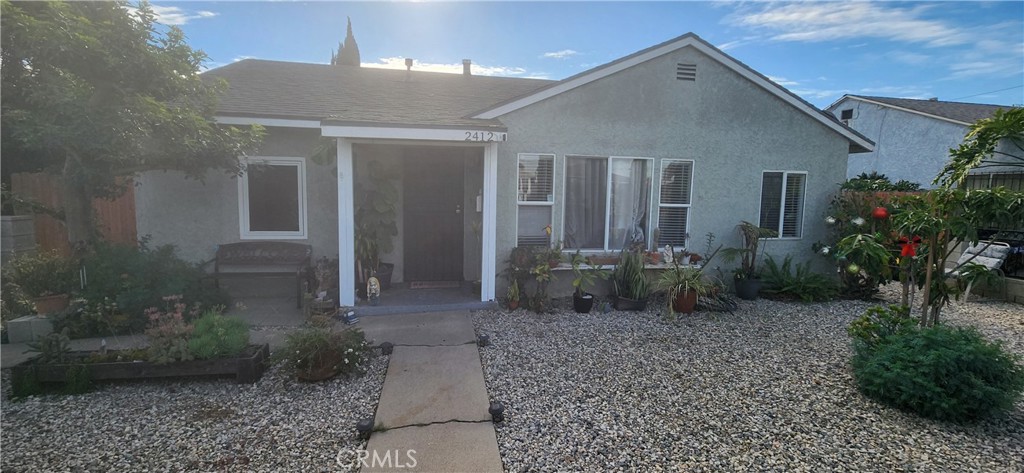 2412 West Alondra Boulevard Compton, CA 90220 - Photo 1 of 32 a view of a house with backyard and garden