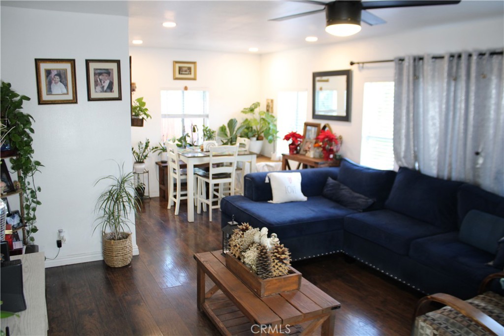 2412 West Alondra Boulevard Compton, CA 90220 - Photo 11 of 32 a living room with furniture and wooden floor