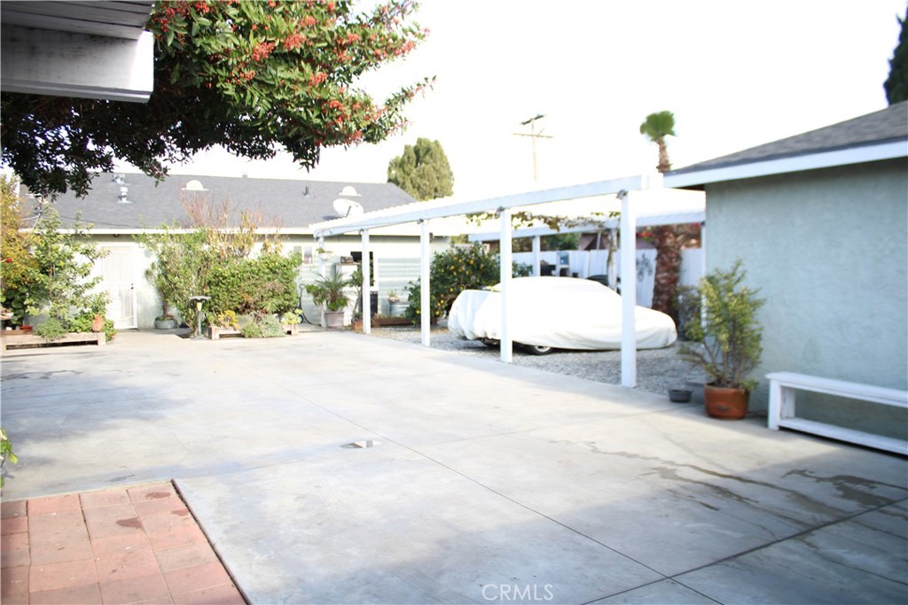 2412 West Alondra Boulevard Compton, CA 90220 - Photo 25 of 32 a view of a patio with couches and potted plants