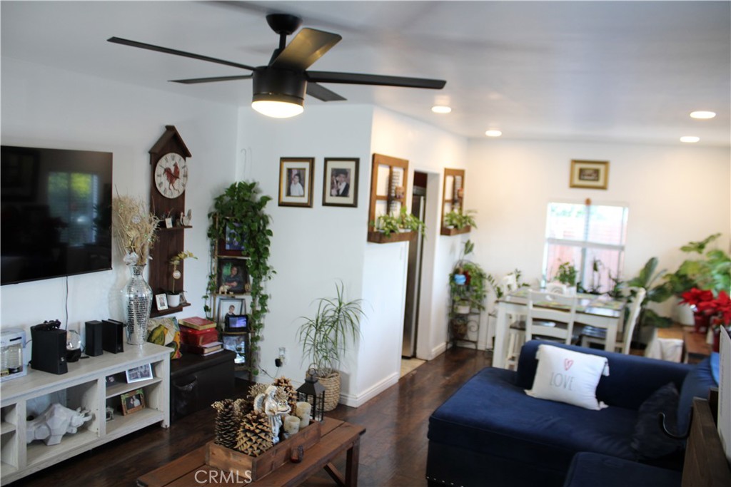 2412 West Alondra Boulevard Compton, CA 90220 - Photo 8 of 32 a living room with furniture and a flat screen tv