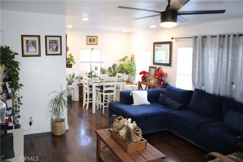 2412 West Alondra Boulevard Compton, CA 90220 - Photo 9 of 32 a living room with furniture and wooden floor