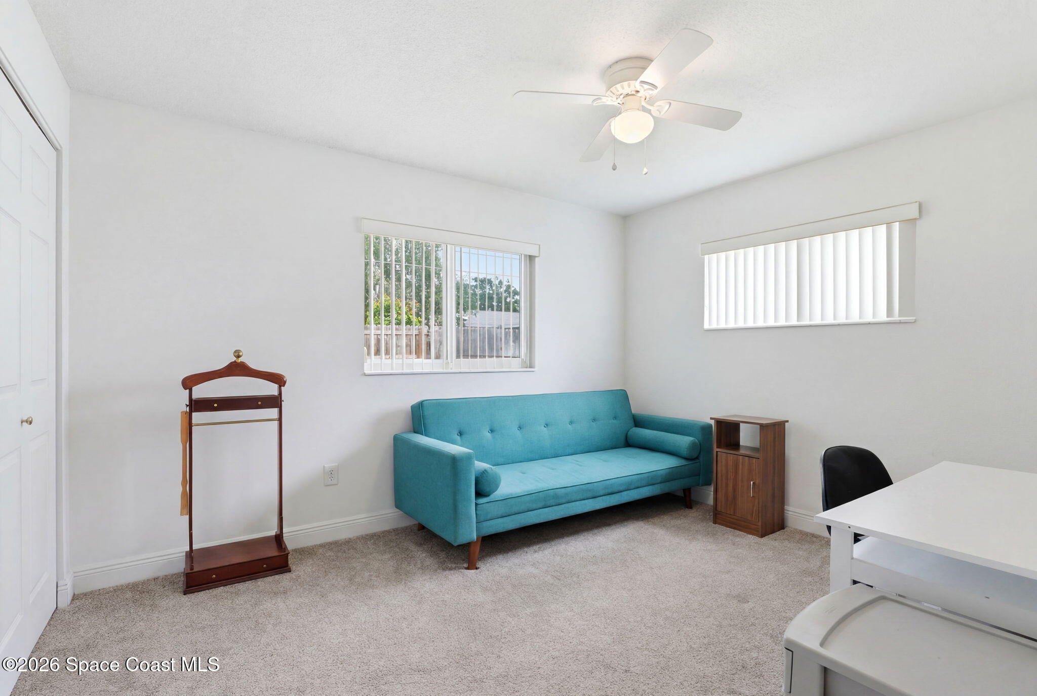 908 Jefferson Road Rockledge, FL 32955 - Photo 20 of 37 a living room with furniture and a window