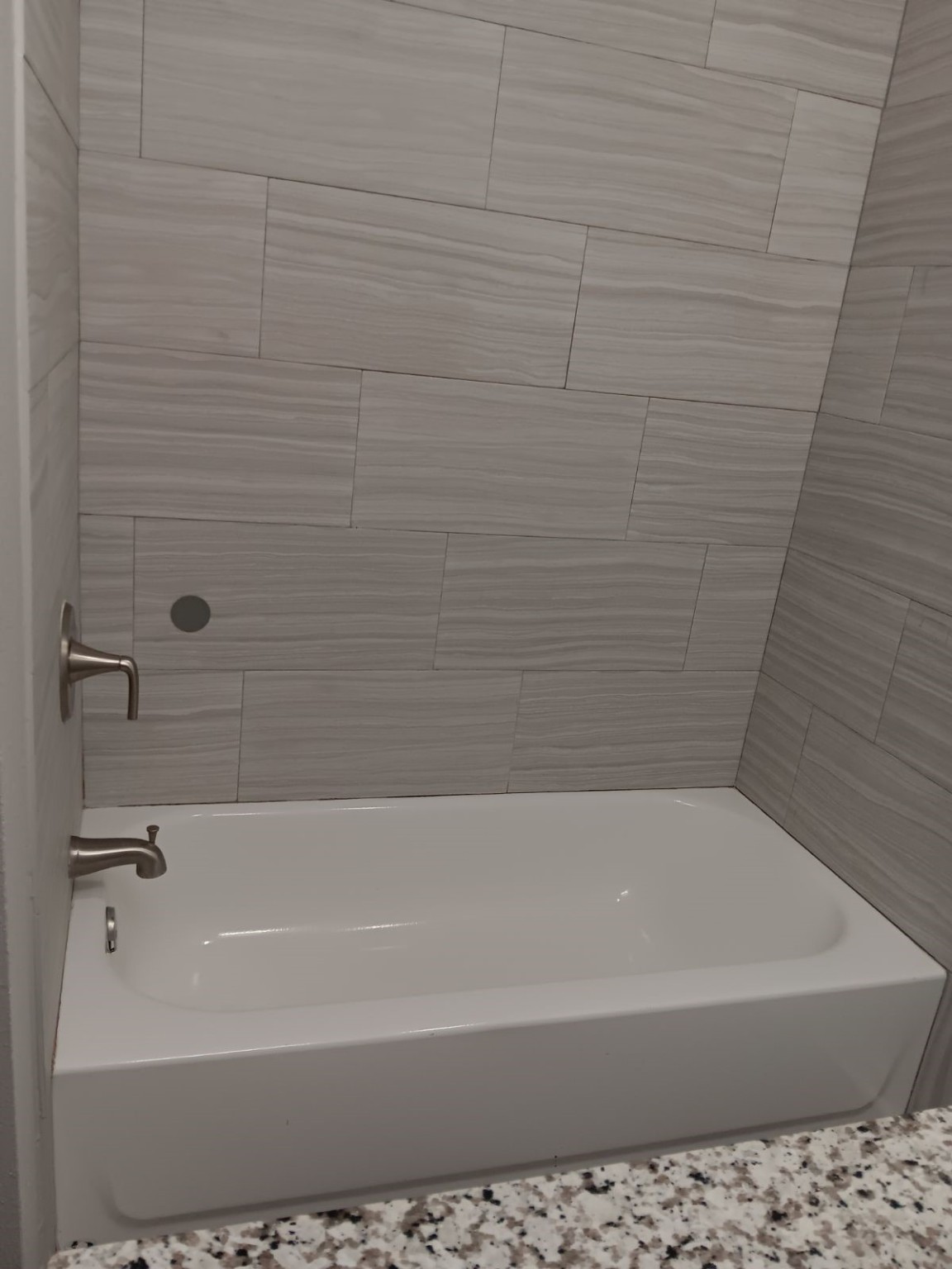 1102 Jackson Avenue Pasadena, TX 77506 - Photo 15 of 22 a bathroom with a bathtub