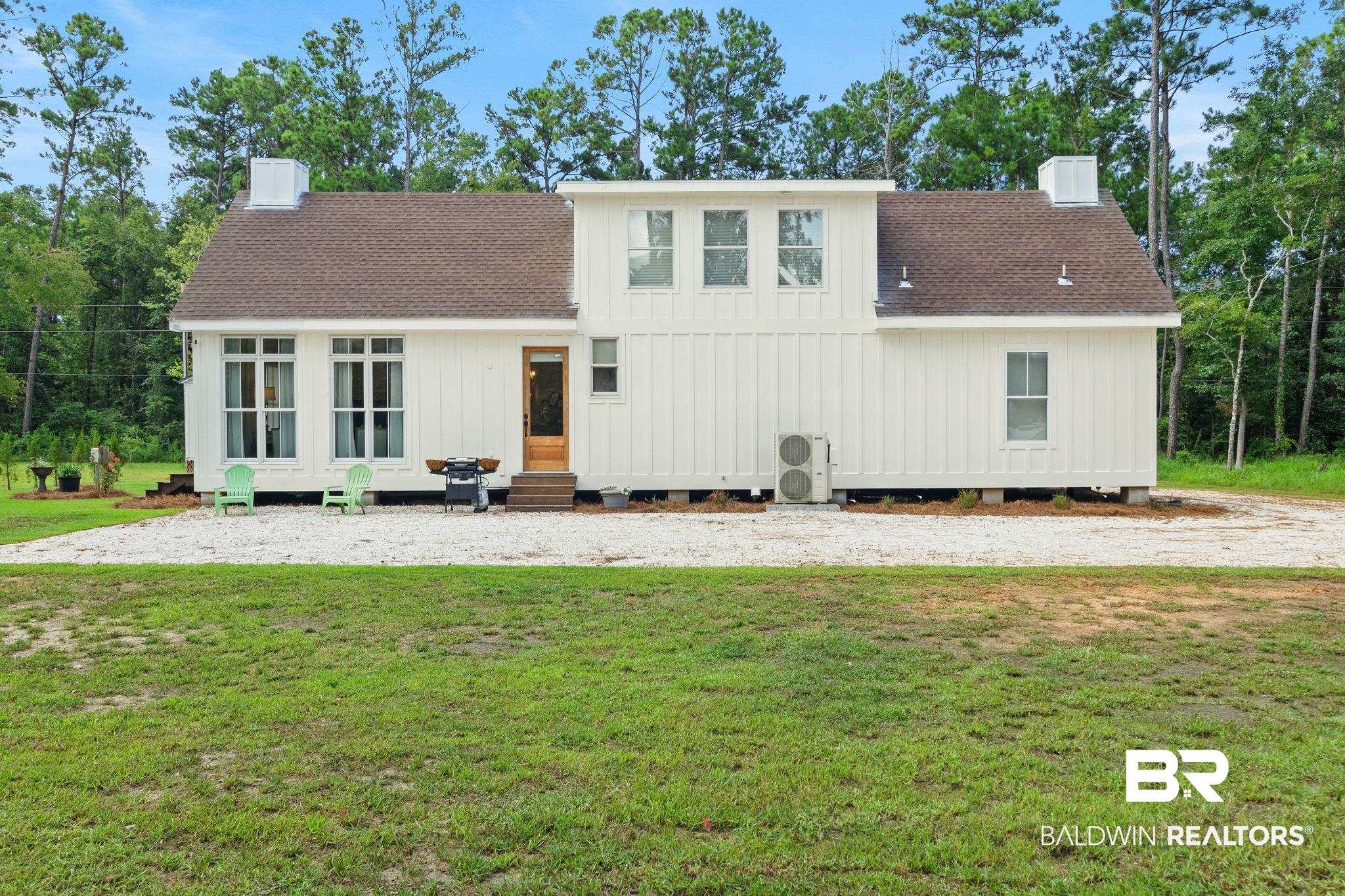 11855 Heather Dells Lane Foley, AL 36535 - Photo 34 of 48 Back of property featuring a lawn