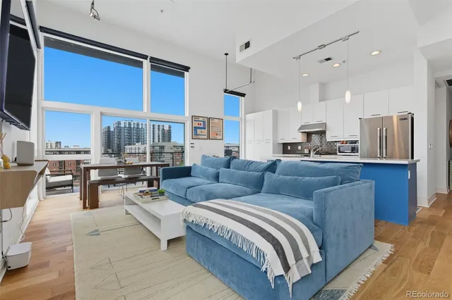 a living room with furniture and a view