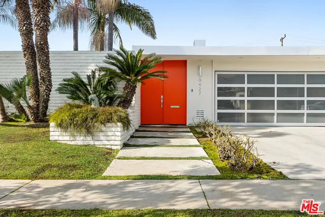 a front view of a house having yard