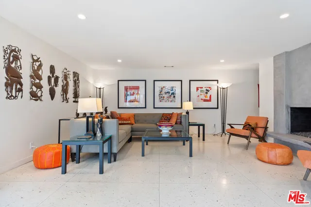 a living room with furniture and a couch