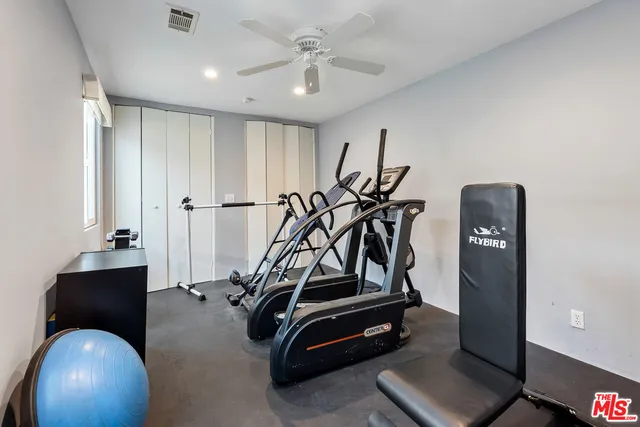 a view of a room with gym equipment