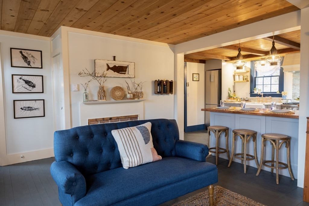 1825 Main Street Barnstable, MA 02668 - Photo 12 of 33 a living room with furniture and wooden floor