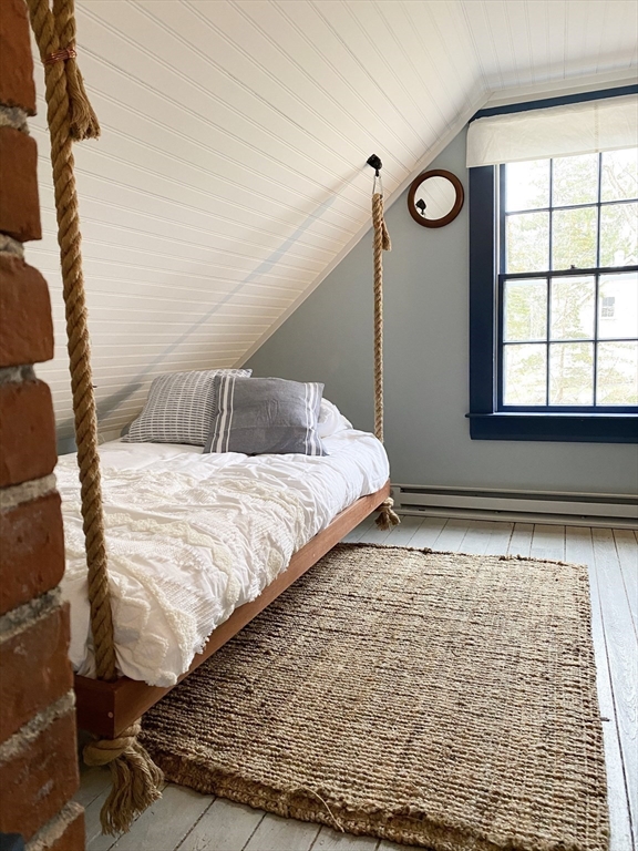 1825 Main Street Barnstable, MA 02668 - Photo 27 of 33 a bedroom with a bed and a window
