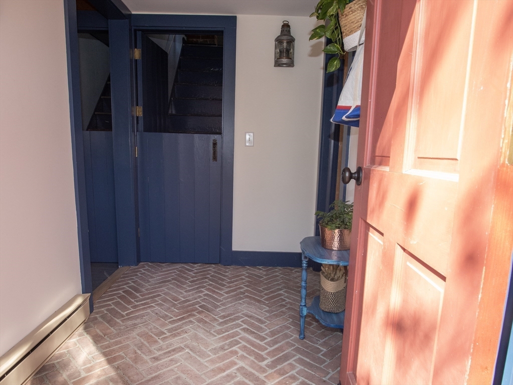 1825 Main Street Barnstable, MA 02668 - Photo 28 of 33 a bedroom with a bed and a window