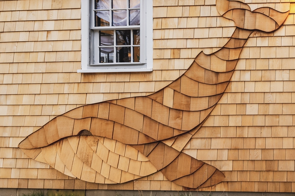 1825 Main Street Barnstable, MA 02668 - Photo 32 of 33 a bathroom with a sink and a shower curtain