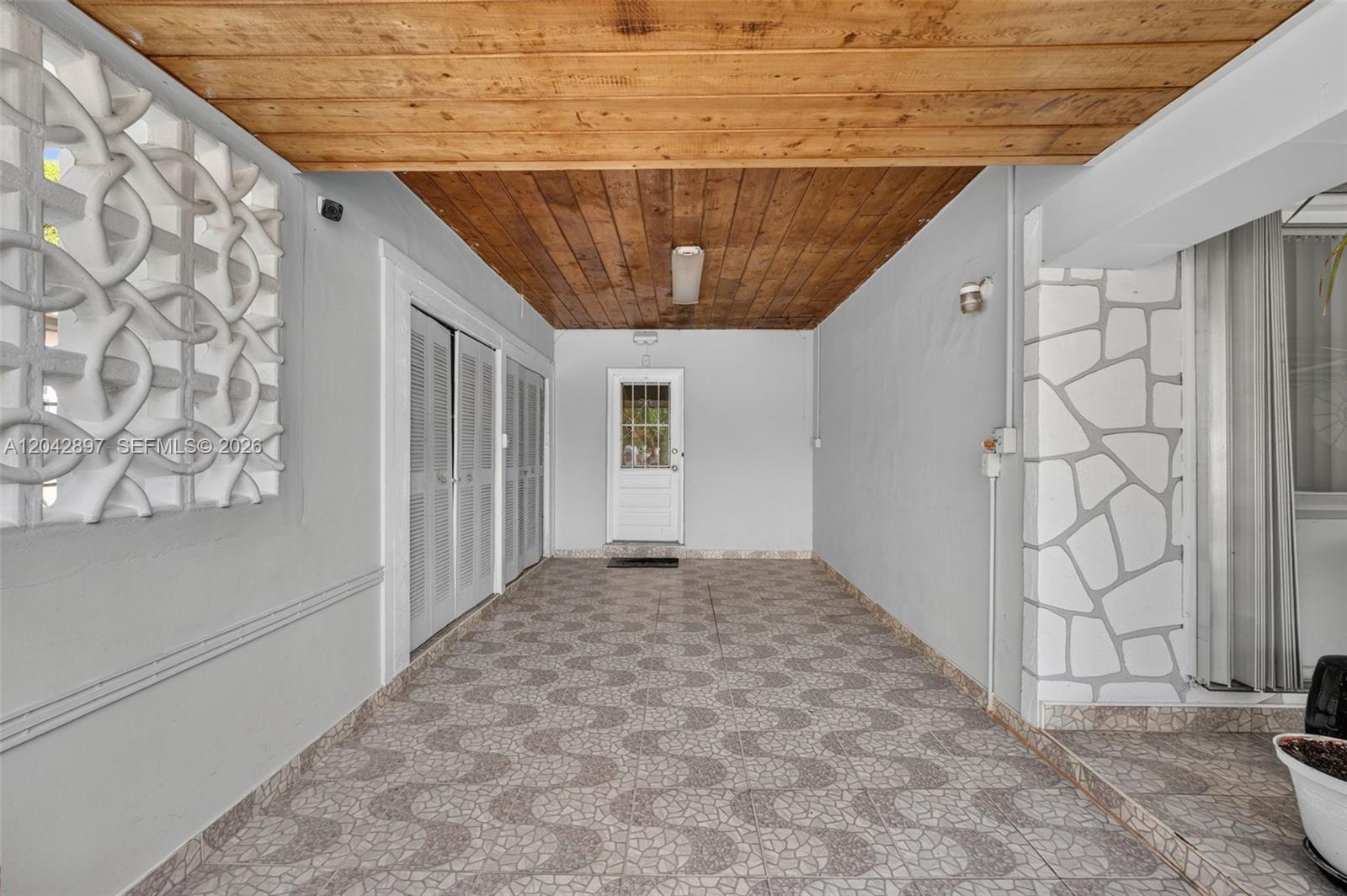 7551 Indigo Street Miramar, FL 33023 - Photo 2 of 25 Carport