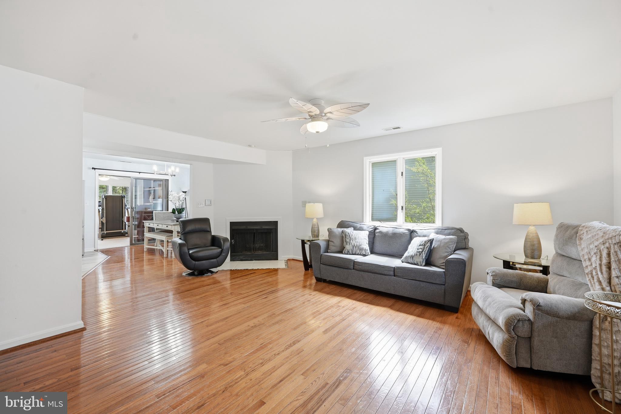 82 Sandyhook Road Berlin, MD 21811 - Photo 12 of 55 a living room with furniture and a wooden floor