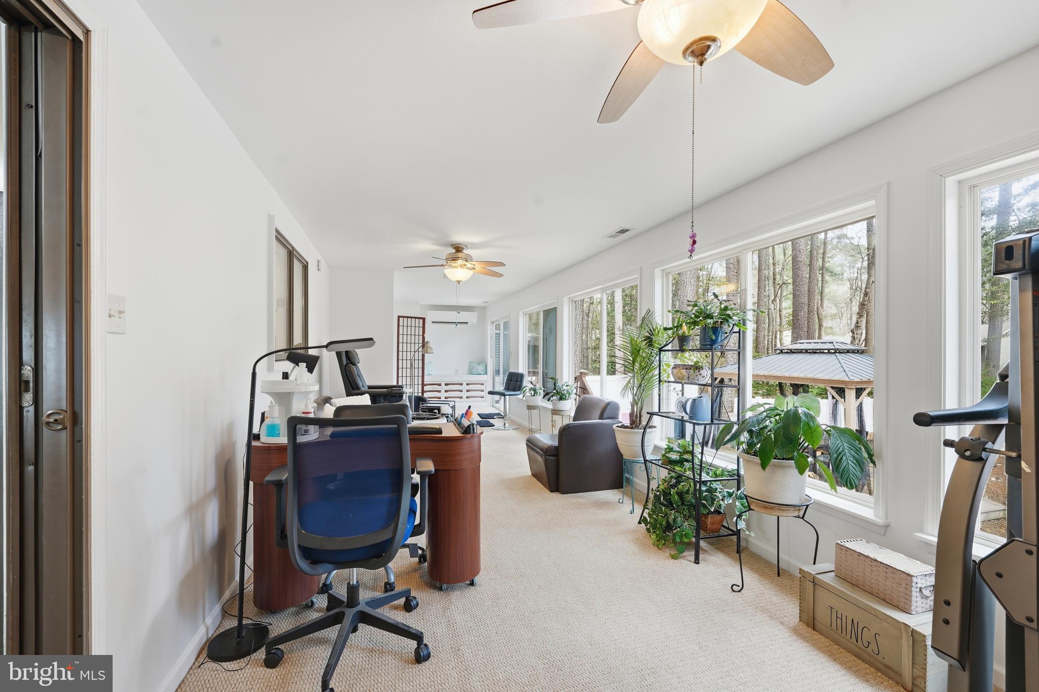 82 Sandyhook Road Berlin, MD 21811 - Photo 15 of 55 a view of a workspace with furniture and a window