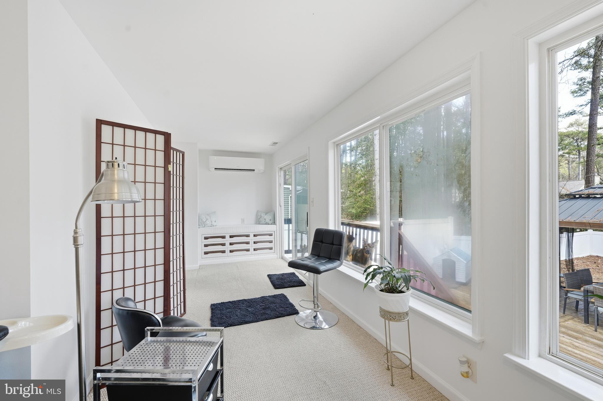 82 Sandyhook Road Berlin, MD 21811 - Photo 16 of 55 a living room with furniture and a large window