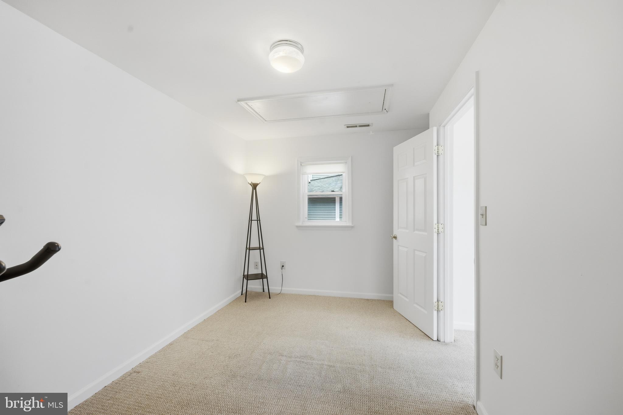 82 Sandyhook Road Berlin, MD 21811 - Photo 17 of 55 an empty room with a empty space and windows