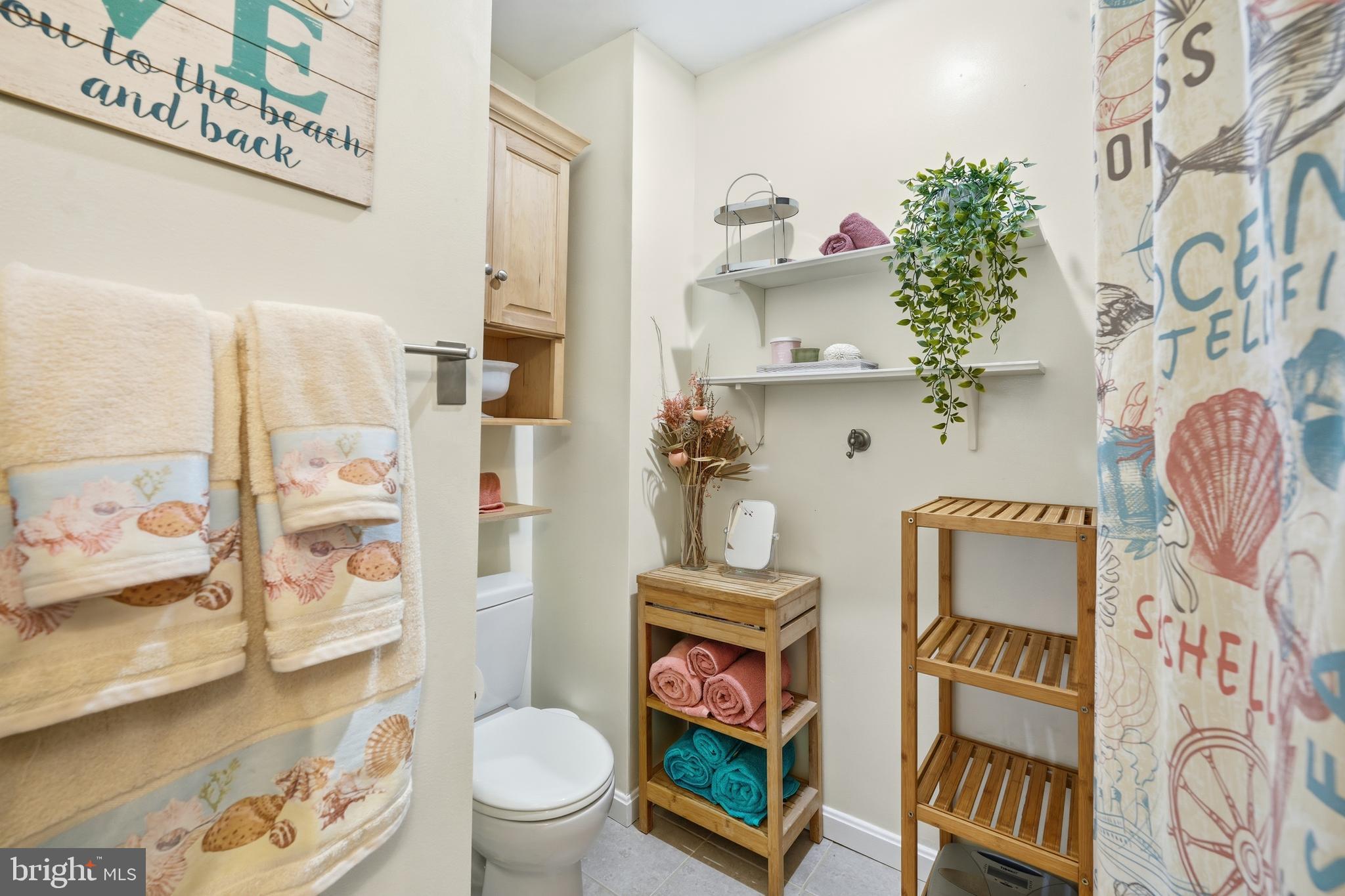 82 Sandyhook Road Berlin, MD 21811 - Photo 31 of 55 a bathroom with a sink toilet and shower