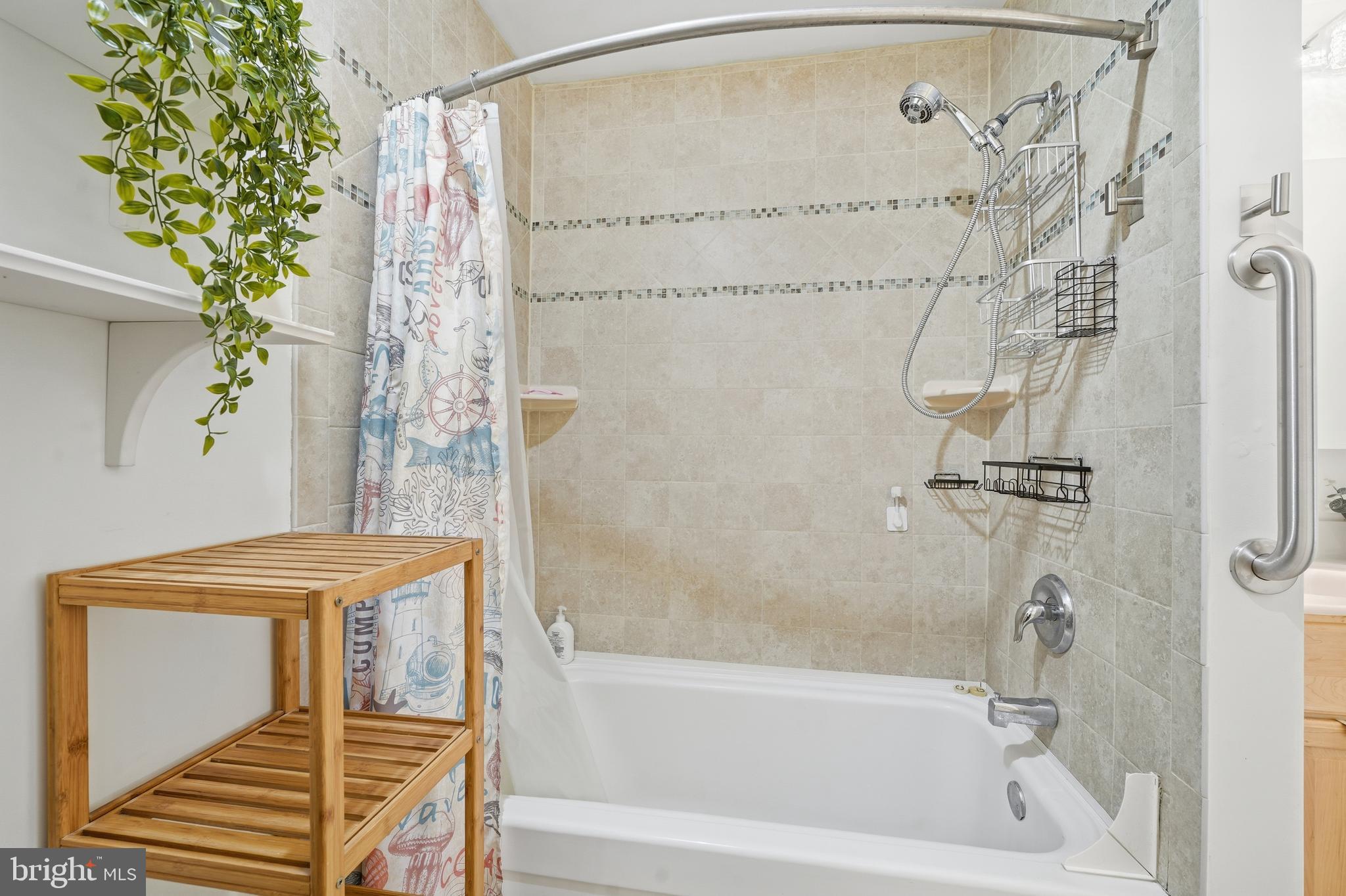 82 Sandyhook Road Berlin, MD 21811 - Photo 32 of 55 a bathroom with a shower and a tub