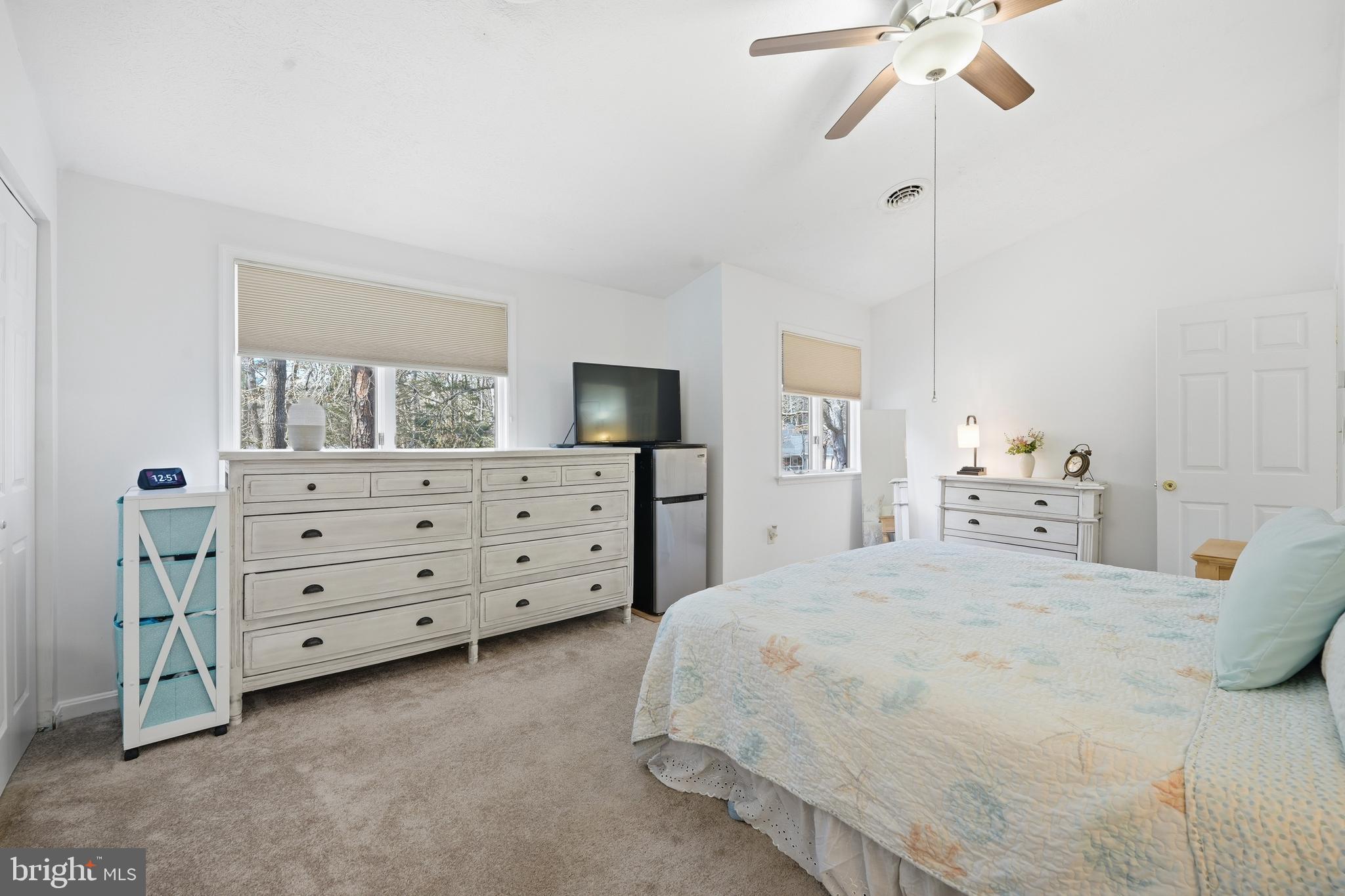 82 Sandyhook Road Berlin, MD 21811 - Photo 33 of 55 a bedroom with a bed and a dresser