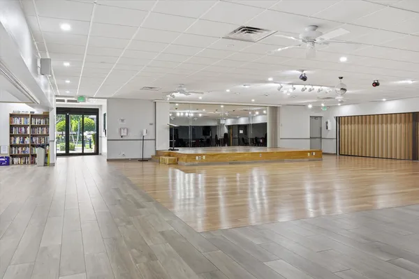 a view of a swimming pool and a living room