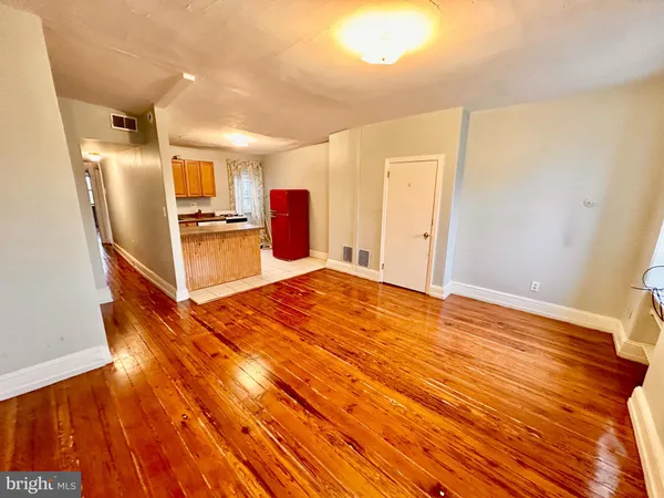 a view of a kitchen from the hallway