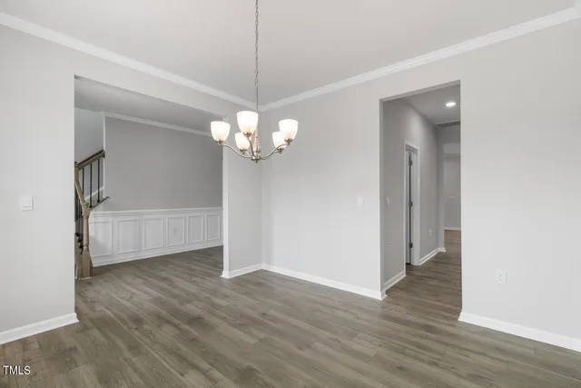 a view of a livingroom with wooden floor
