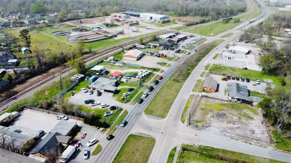an aerial view of a swimming pool and outdoor space