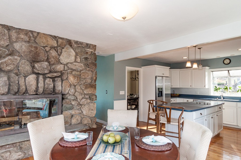 685 Jerusalem Road Cohasset, MA 02025 - Photo 13 of 29 a kitchen with stainless steel appliances a table and chairs