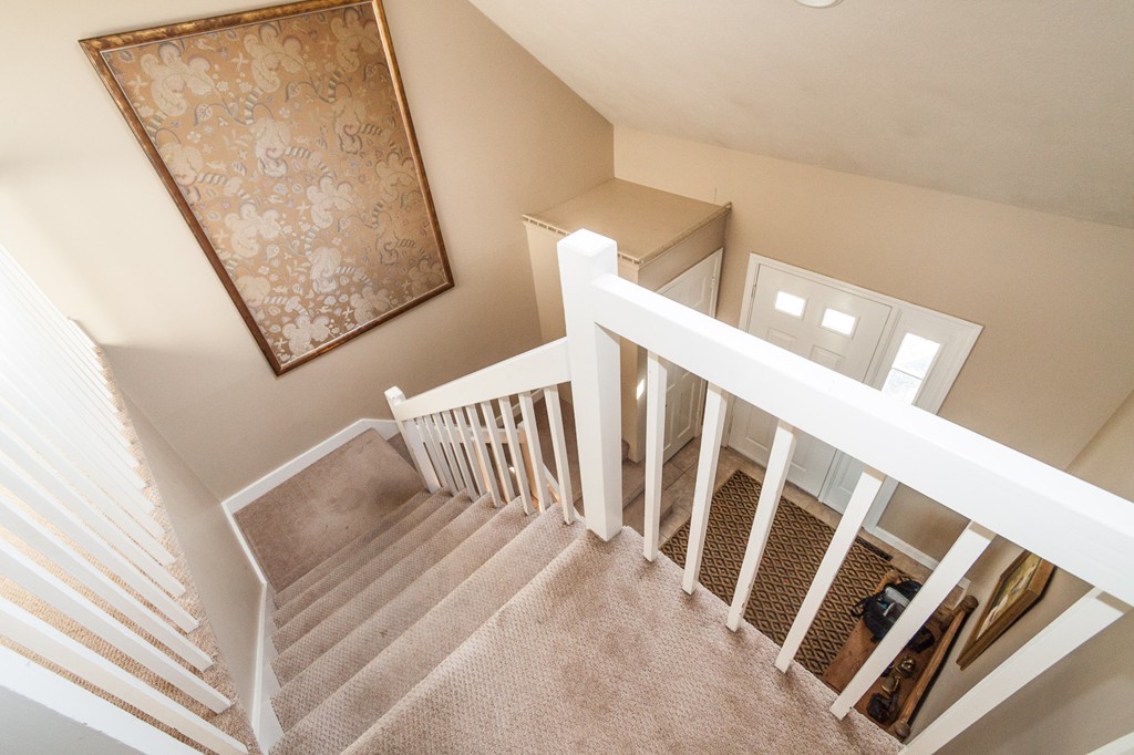 685 Jerusalem Road Cohasset, MA 02025 - Photo 18 of 29 a view of staircase with railing and white walls