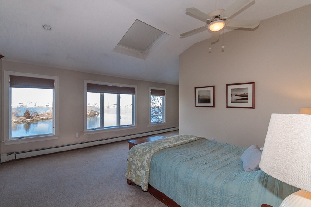 685 Jerusalem Road Cohasset, MA 02025 - Photo 20 of 29 a bedroom with a large bed and a window