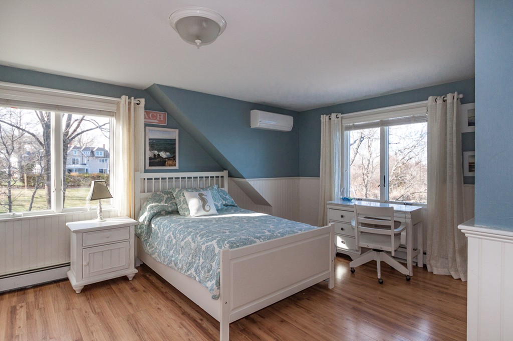 685 Jerusalem Road Cohasset, MA 02025 - Photo 23 of 29 a living room with a bed furniture and a large window