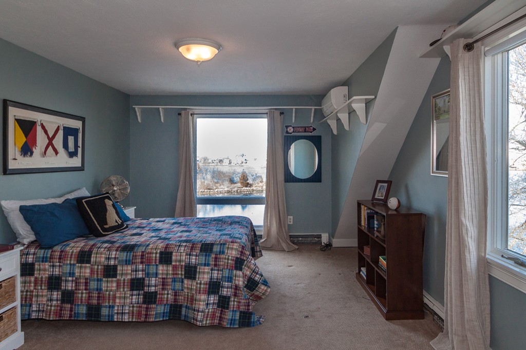 685 Jerusalem Road Cohasset, MA 02025 - Photo 24 of 29 a bedroom with a bed and window