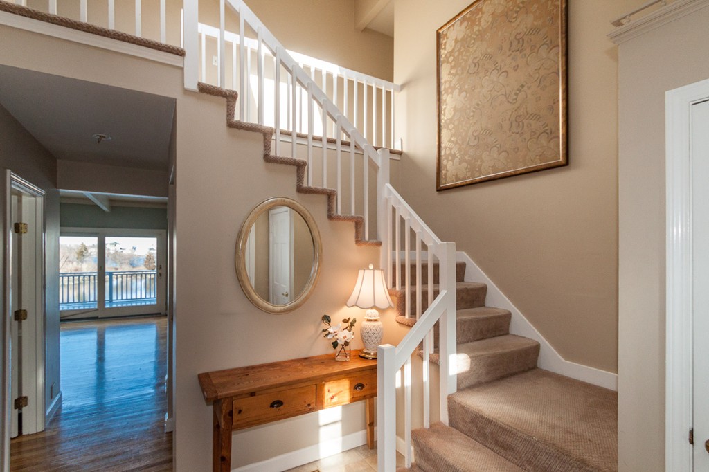 685 Jerusalem Road Cohasset, MA 02025 - Photo 5 of 29 a view of entryway and hall with wooden floor