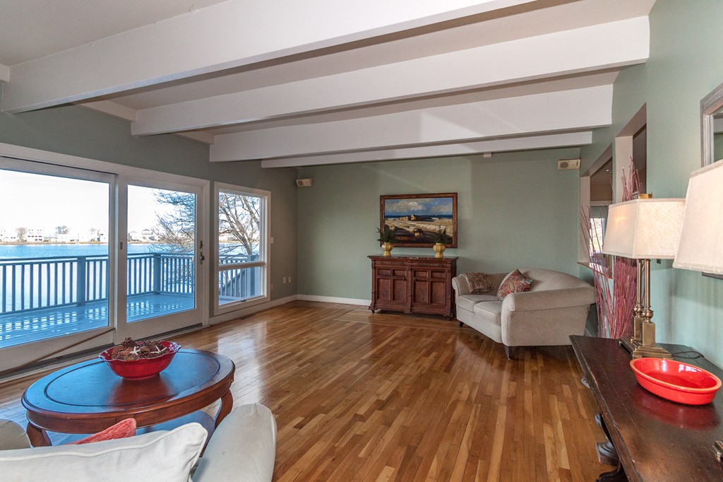 685 Jerusalem Road Cohasset, MA 02025 - Photo 6 of 29 a living room with furniture and a wooden floor